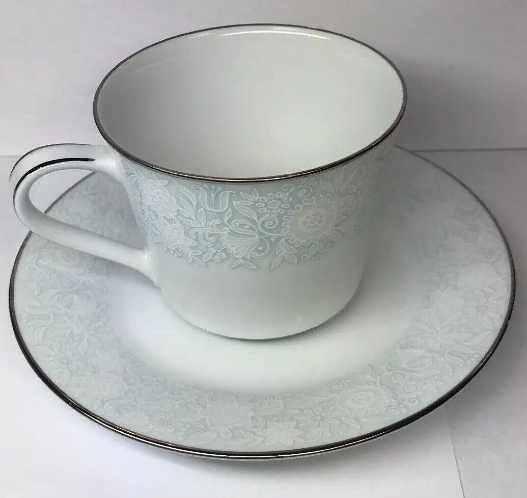 Retired Noritake Ravel Pattern White Flowers w/Blue Silver Trim Cup/Saucer Set