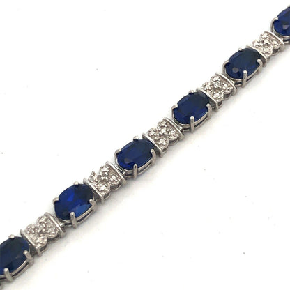 Stunning 10K White Gold Simulated Sapphire Diamond Anniversary Tennis Bracelet