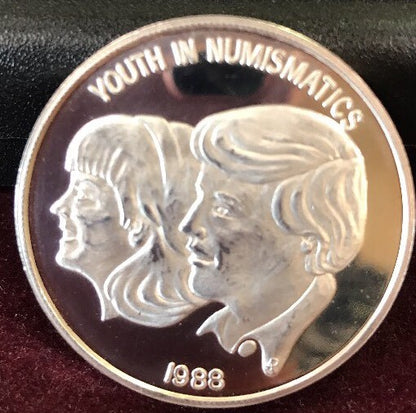 1988 Numismatic Association of Southern California 999 Silver Youth in Numis Rnd