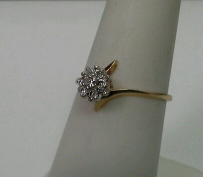 10k Yellow Gold Ring with .05tcw 1/20 Diamond Cluster Size 6.25