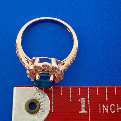 Strawberry Toned 925 Sterling Silver Oval Blue Cubic Zirconia White CZ Halo Ring