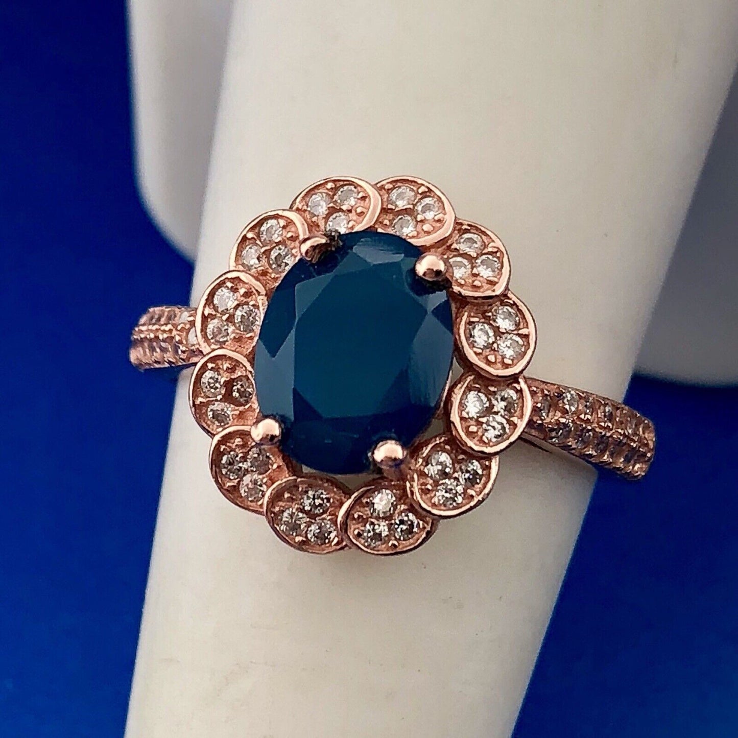 Strawberry Toned 925 Sterling Silver Oval Blue Cubic Zirconia White CZ Halo Ring