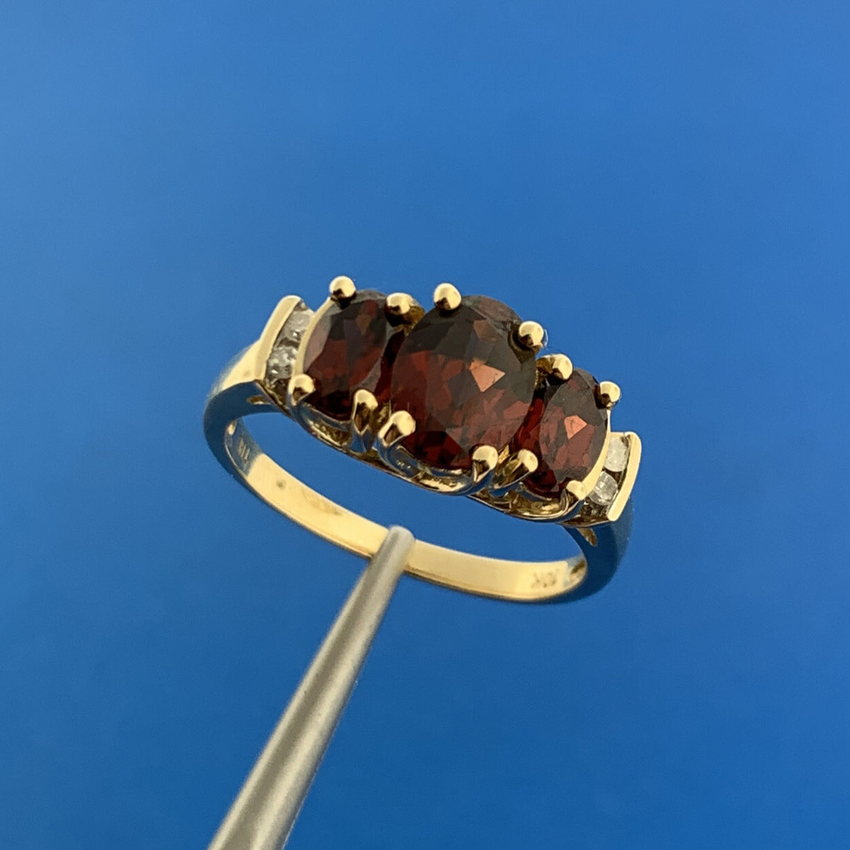 Samuel Aaron THL 10K Yellow Gold Oval Garnet Trio Diamond Accent January Ring