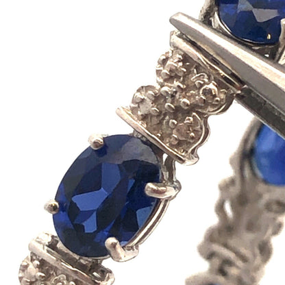Stunning 10K White Gold Simulated Sapphire Diamond Anniversary Tennis Bracelet