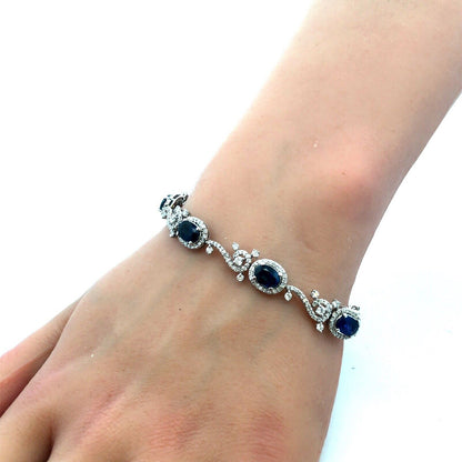 Designer K 18K White Gold Oval Blue Sapphire Diamond Swirl Tennis Bracelet